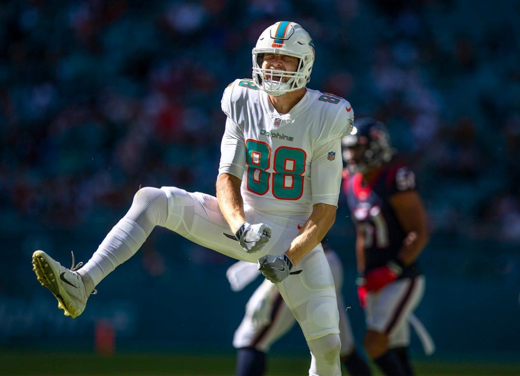 Mike Gesicki celebrates making a catch against the Texans